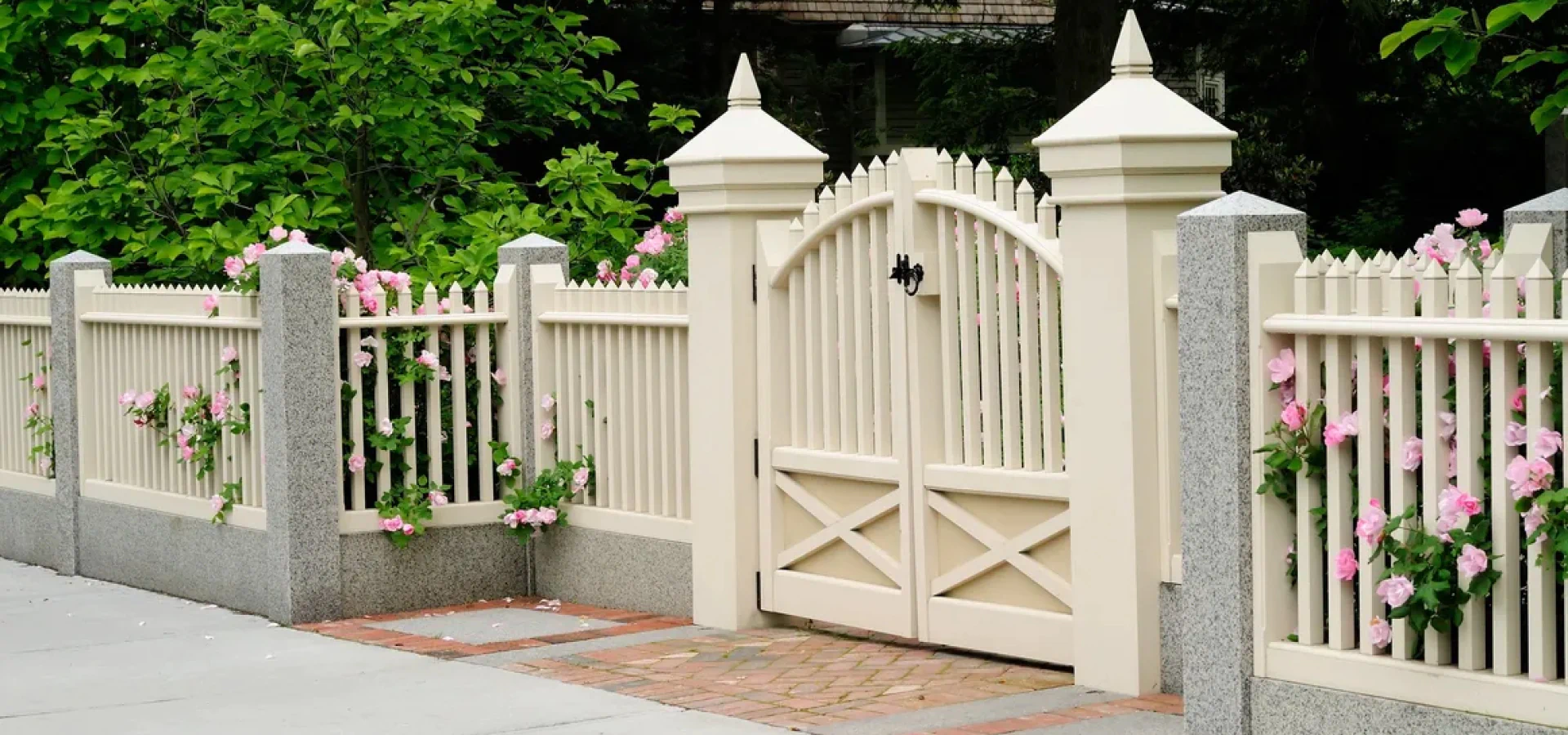 cream colored fence and gate